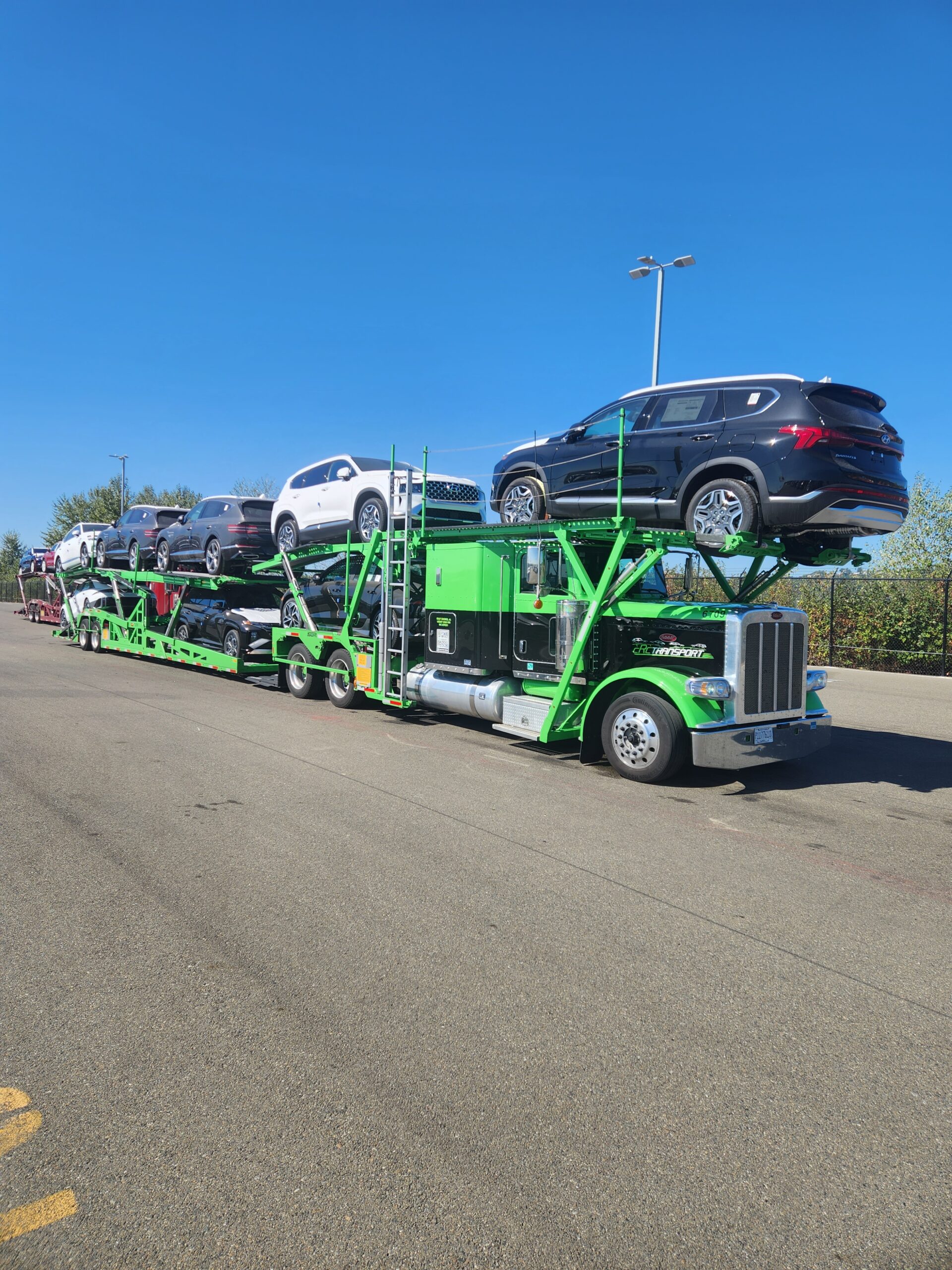 Integrating Auto Transport Scheduling into Dealership Inventory Planning