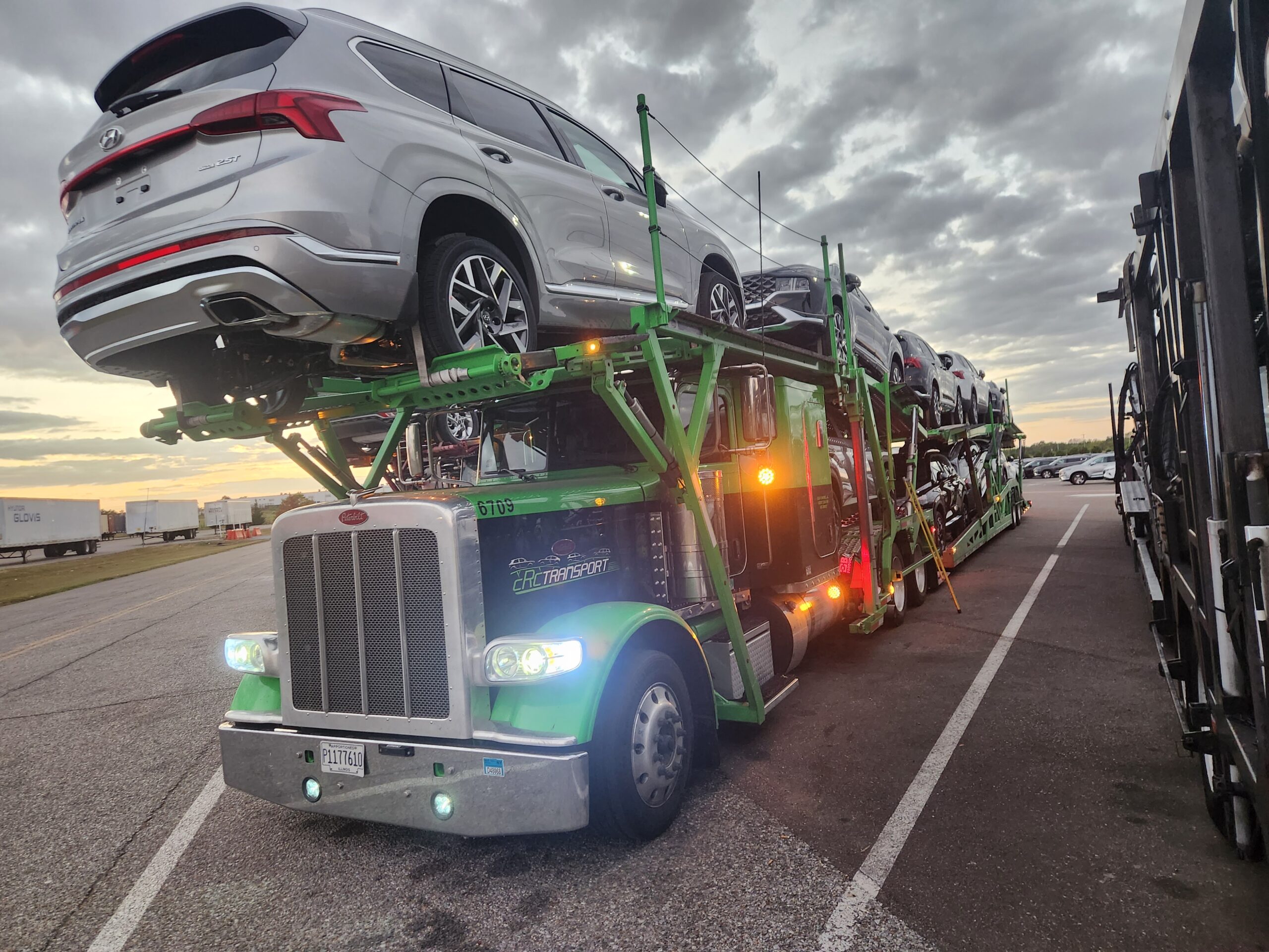 Green-Car-Hauler-With-Cars