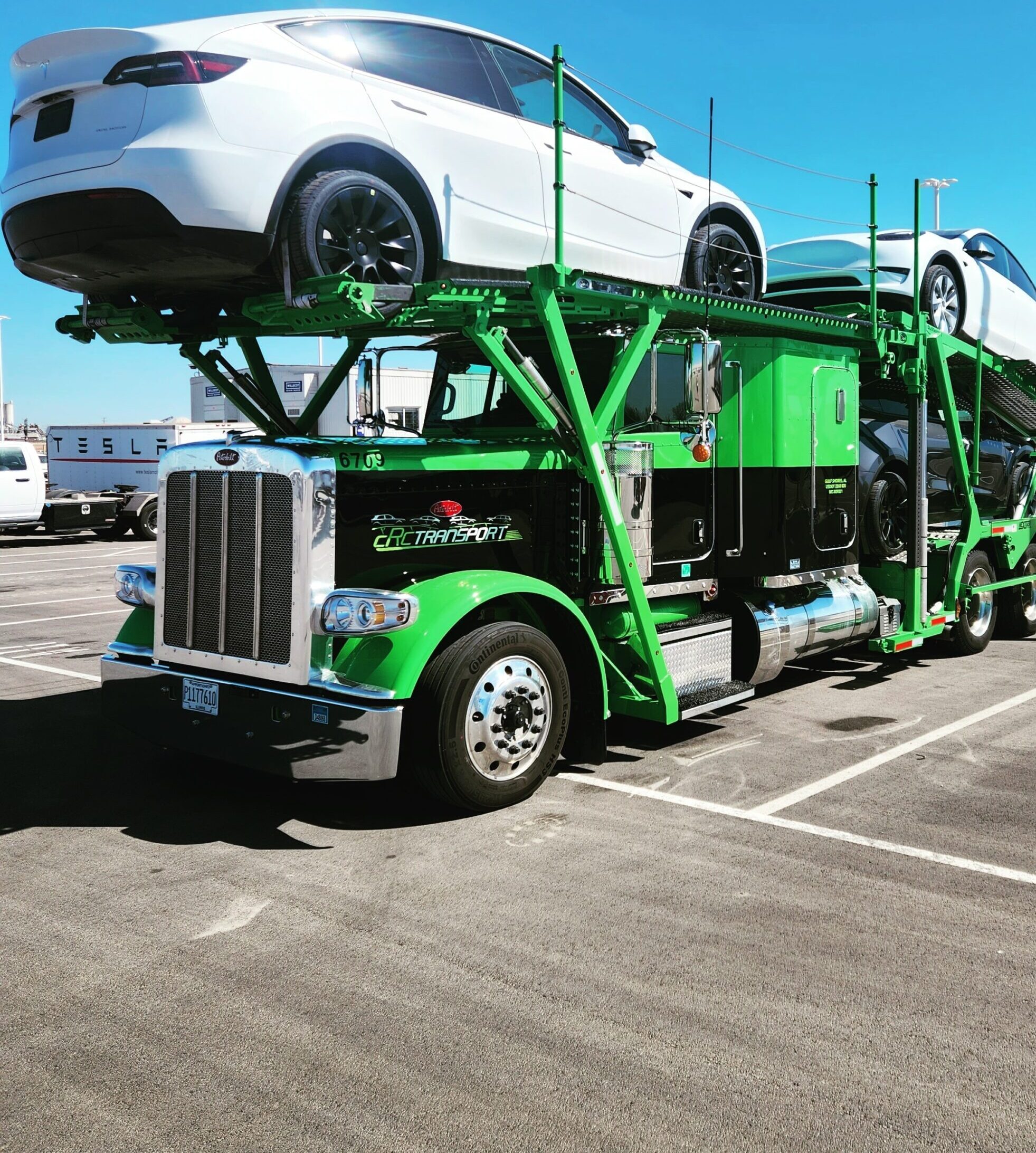Green Car Hauler With Tesla